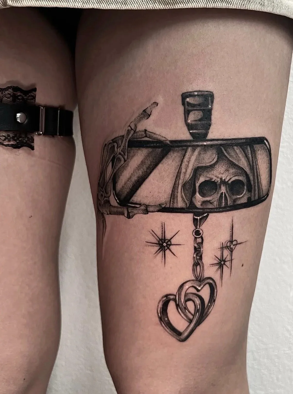 Skull in a rearview mirror — Jax Baiza